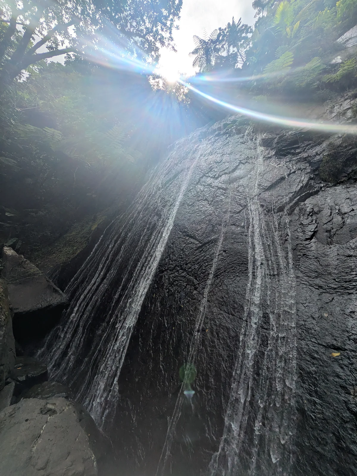 Waterfall cascading down a sheer rock face