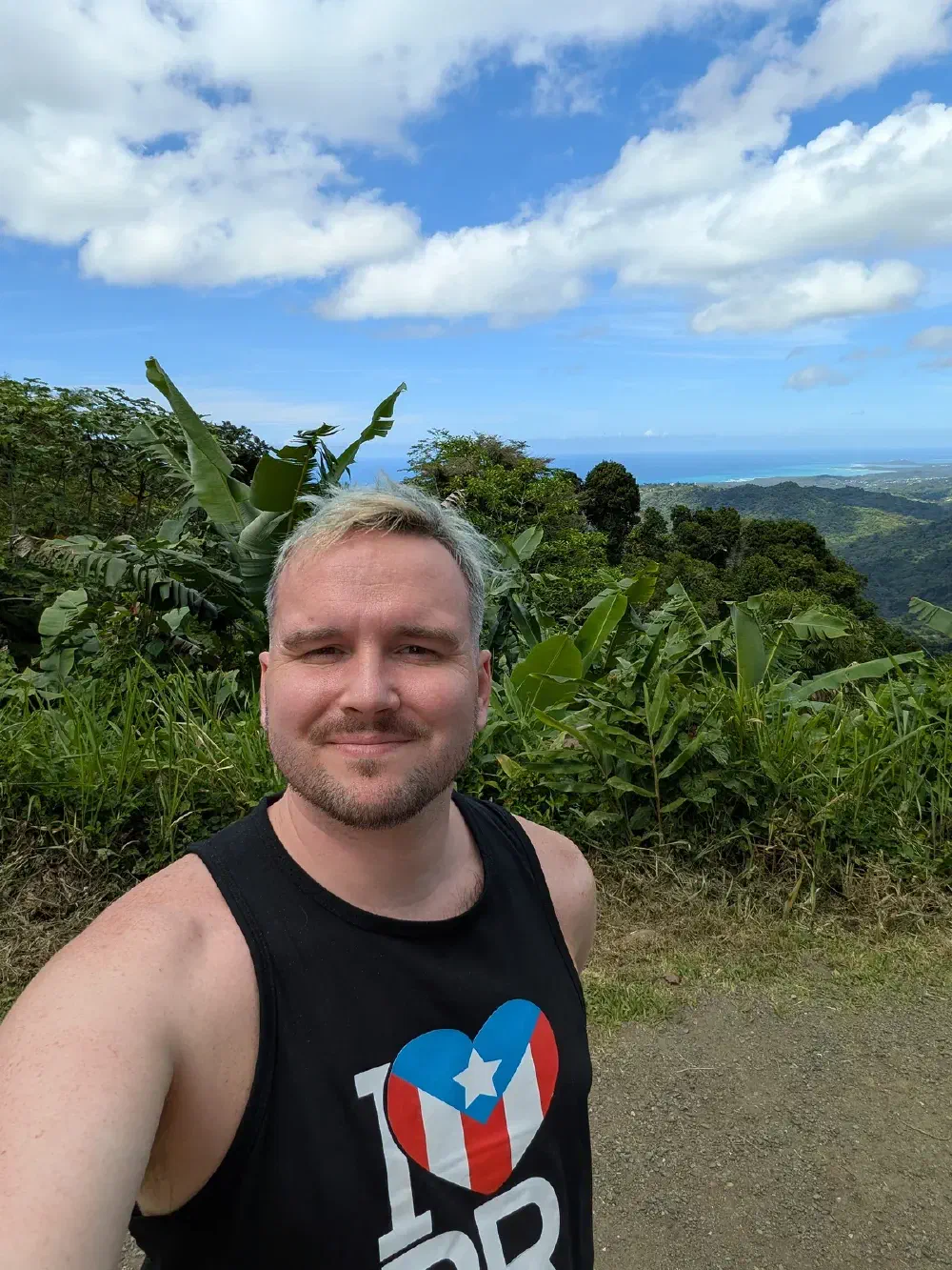 Trail selfie overlooking the landscape