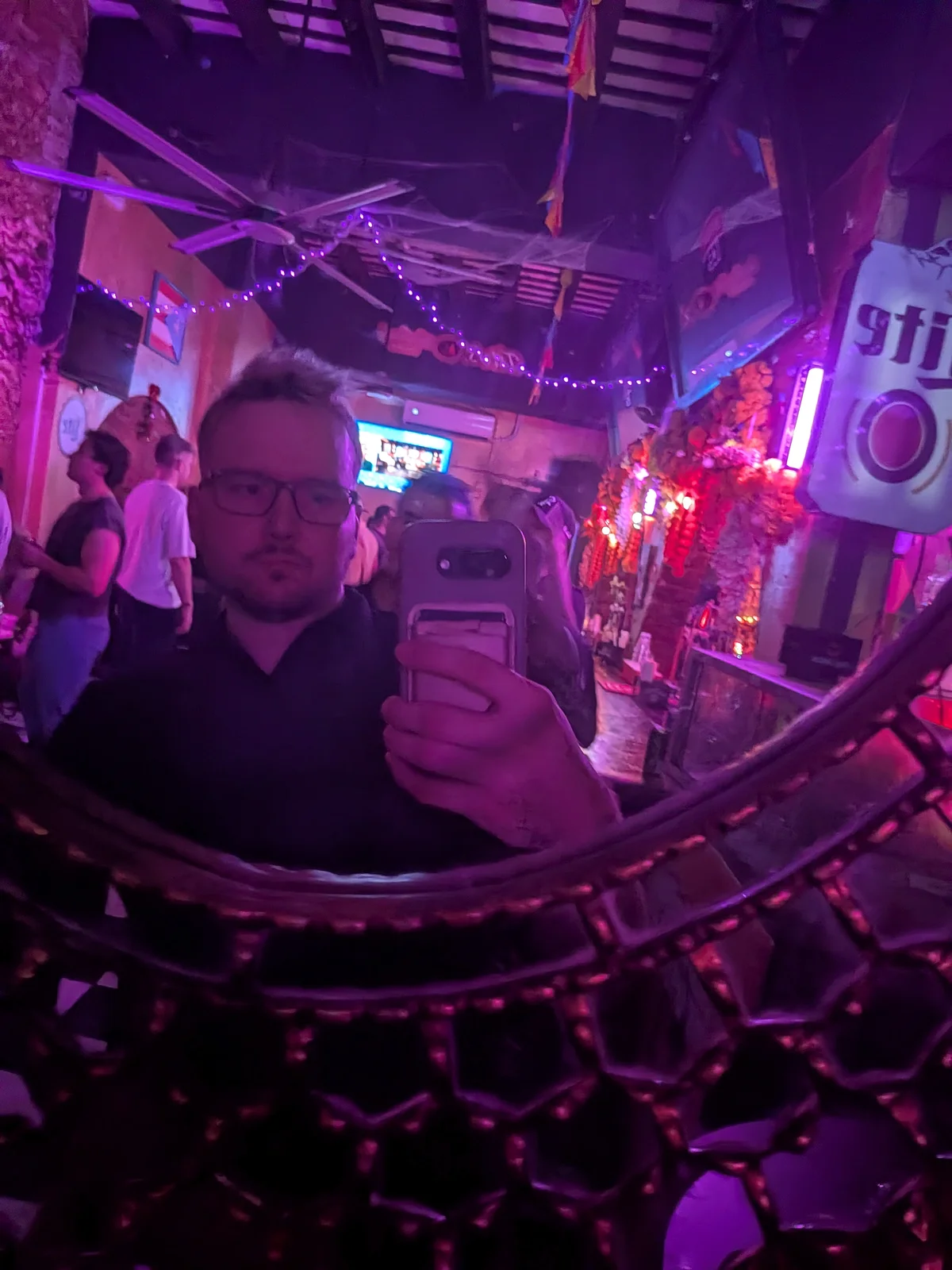 Neon-lit bar district — the last scene before leaving San Juan