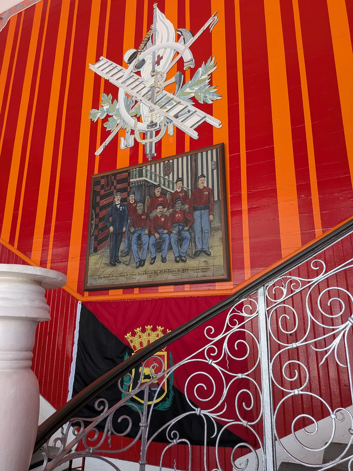 Inside Parque de Bombas — 1899 painting and ornate staircase