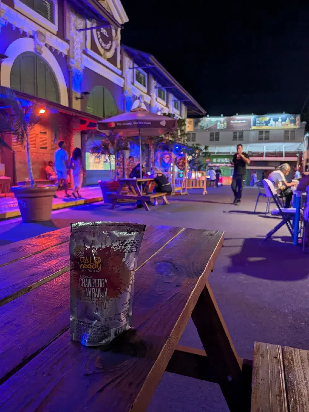 Palo packet on the table — the nightlife strip