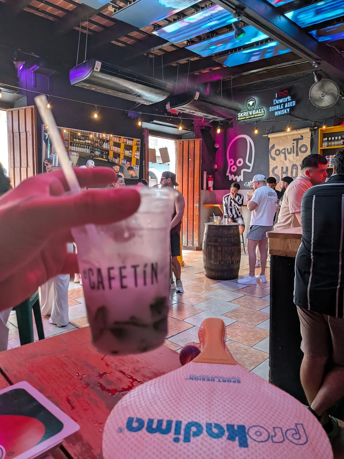 El Cafetín — coquito shots and the crowd